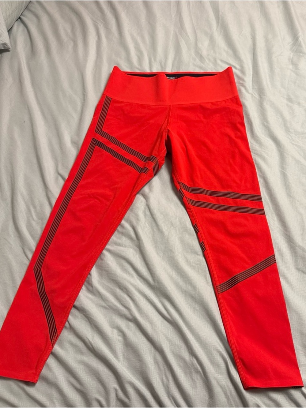 Reebok Bright Red Performance Leggings with Black Stripe Accents